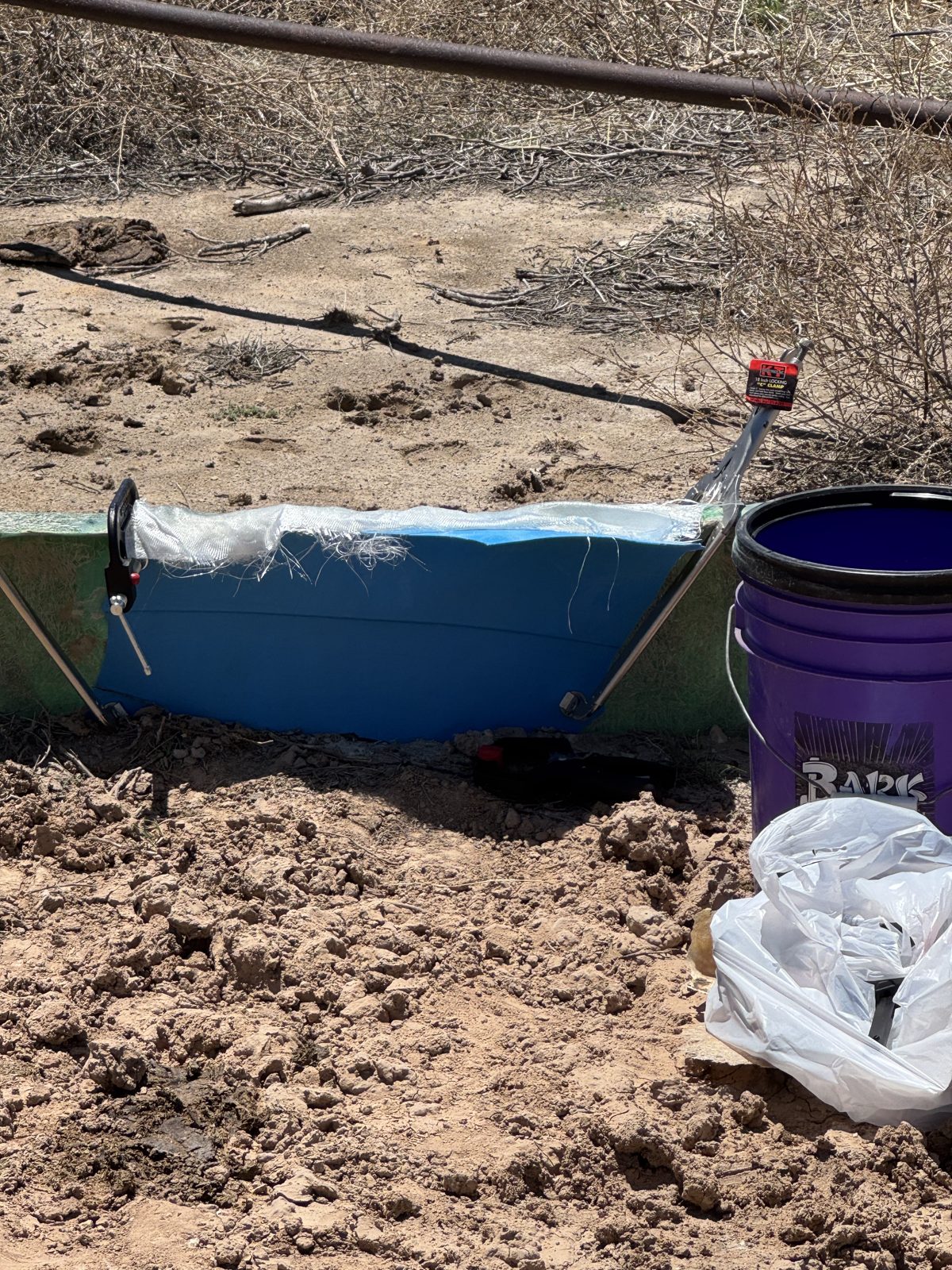 Stock tank repair on the Ellison ranch, Texas Panhandle